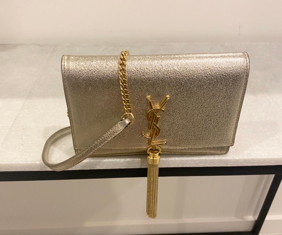 ysl gold tassel bag